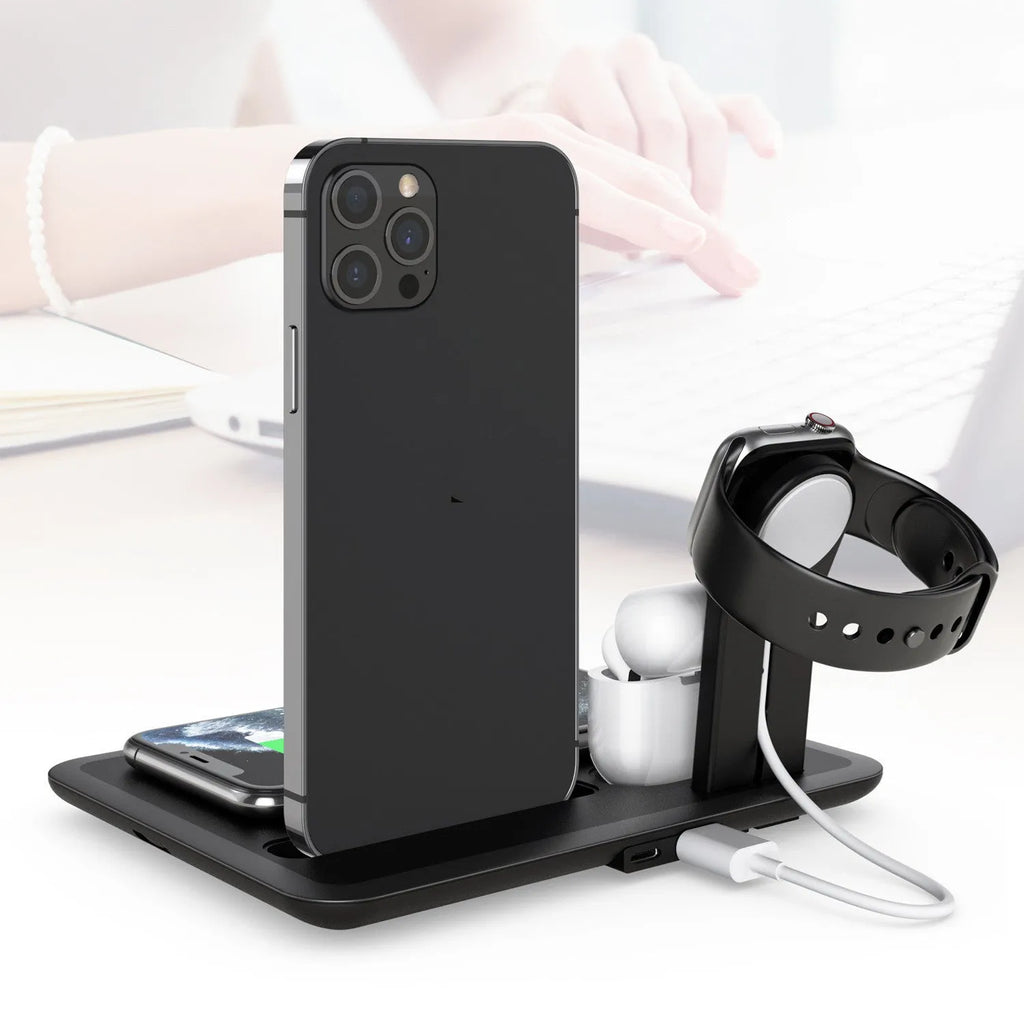 Black wireless charging station for phone, watch and headphones on desk