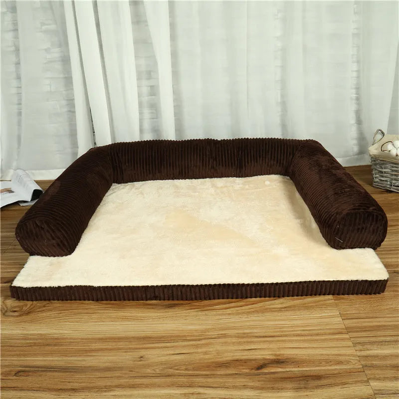 Corduroy pet sofa dog bed in grey with raised sides on a wooden floor