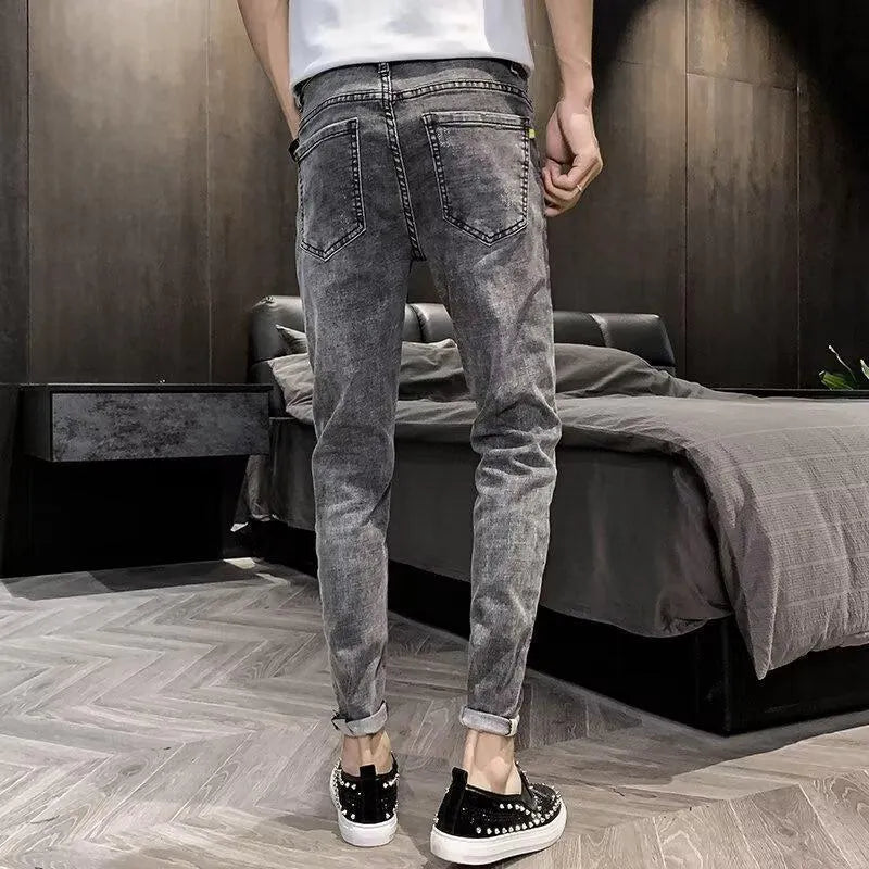 Men's high waist cotton jeans with button fly and tapered leg in picture colour
