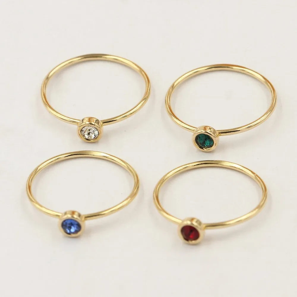14K gilded women's knuckle ring with cubic zirconia stone in green, blue, dark red or white colours