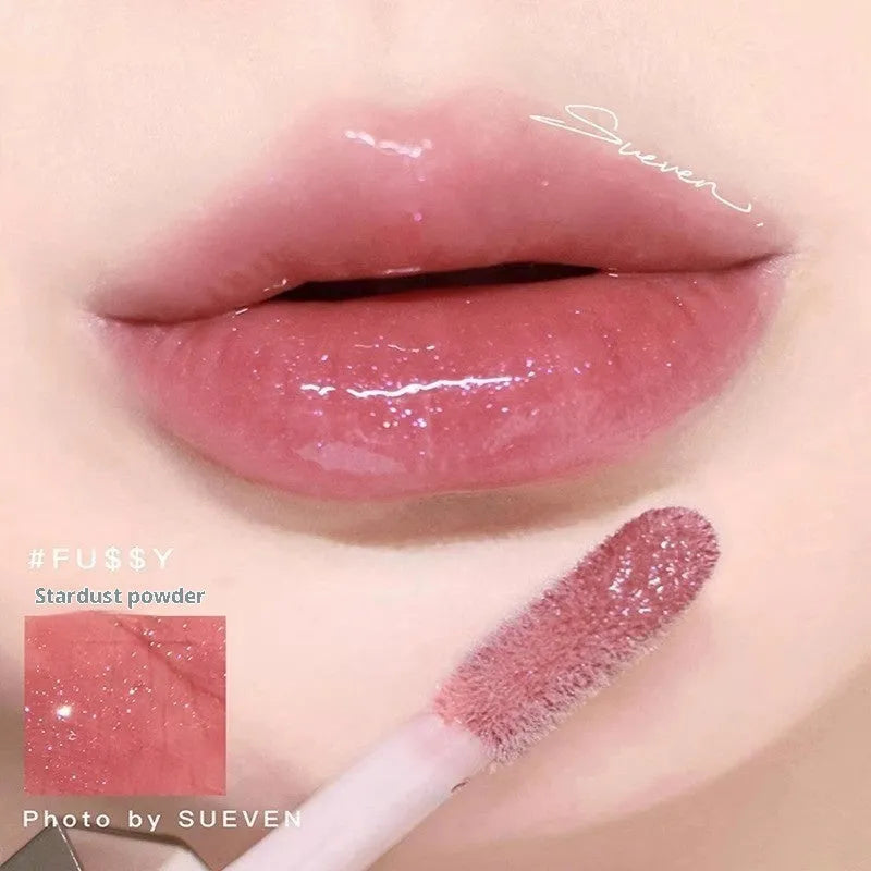 Mirror Water Light Highlight Lip Lacquer in streamer shade with glossy finish and applicator wand