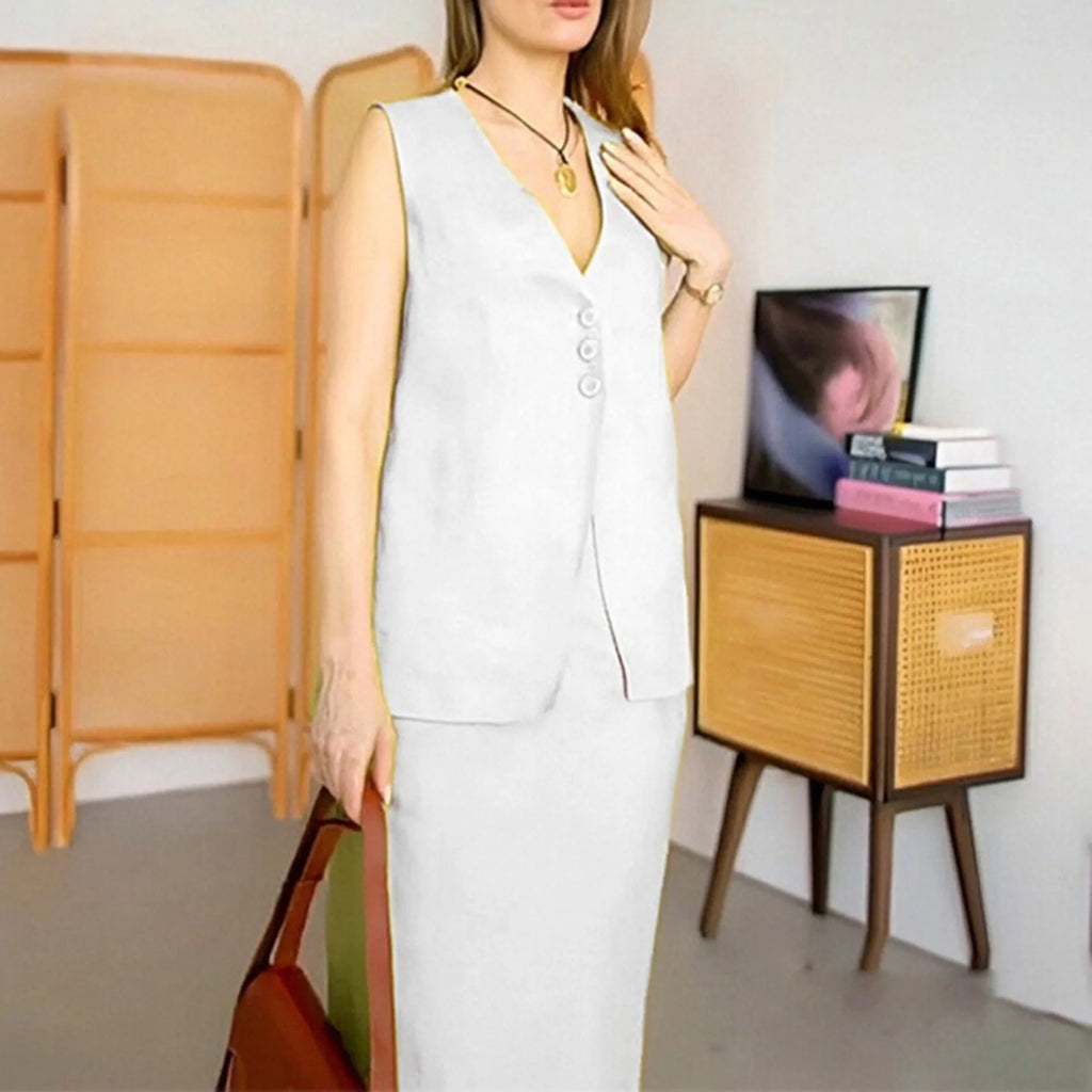 Blue sleeveless vest and matching long skirt two-piece set laid flat.