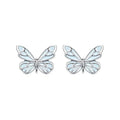 Set of 925 silver luminous butterfly bracelet necklace and earrings with floral petals on white background