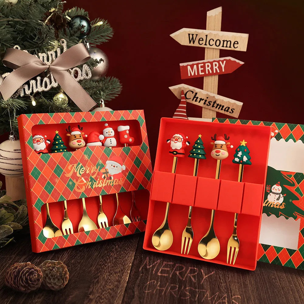 Stainless steel Christmas spoon and fork set with red handles and mirror-polished finish featuring Christmas tree and snowman patterns
