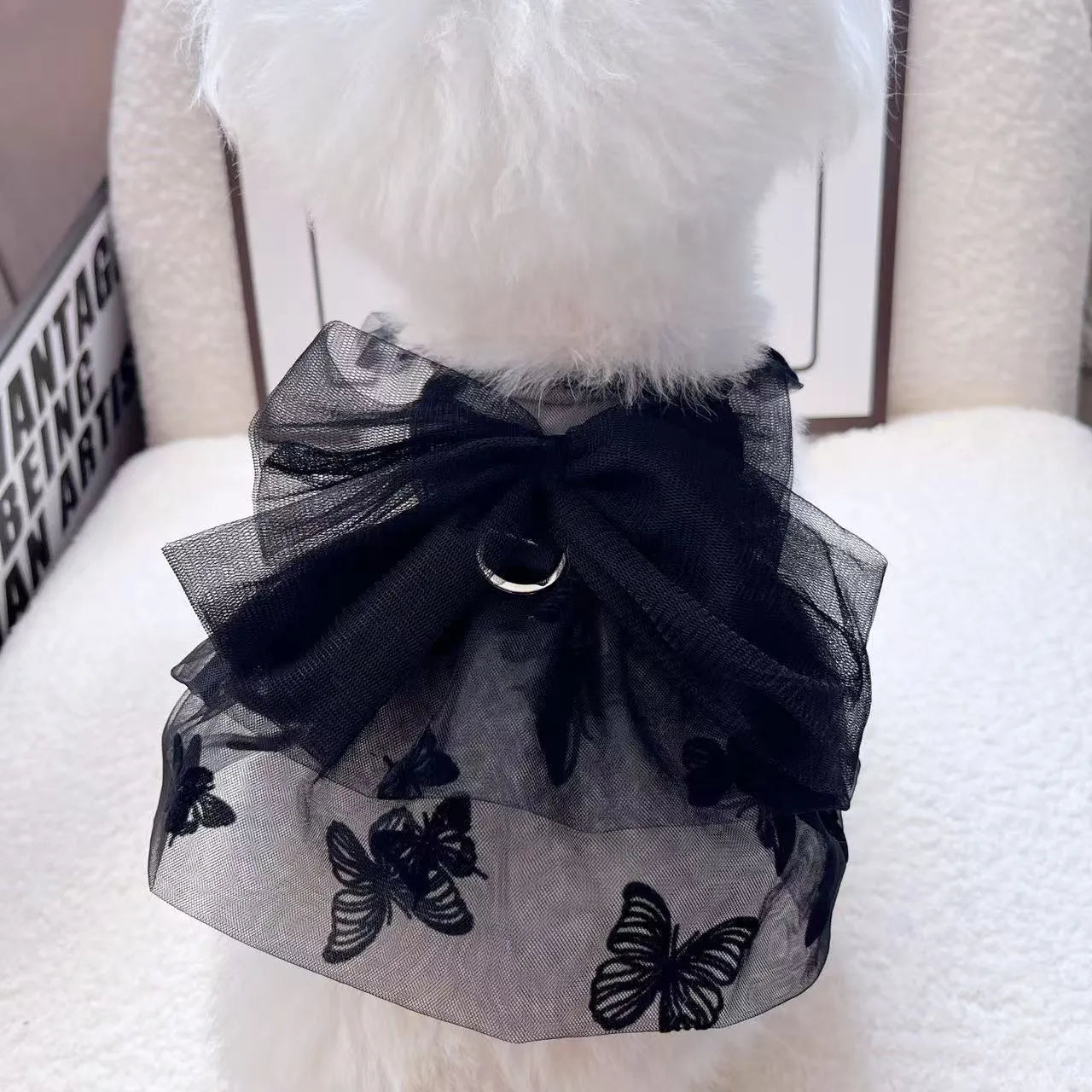 Black gauze tulle skirt pet costume for small to medium dogs and cats on a mannequin.