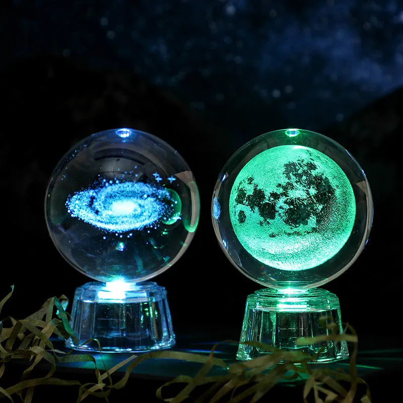 Transparent 6cm white crystal ball ornament with inner carving on a tabletop.