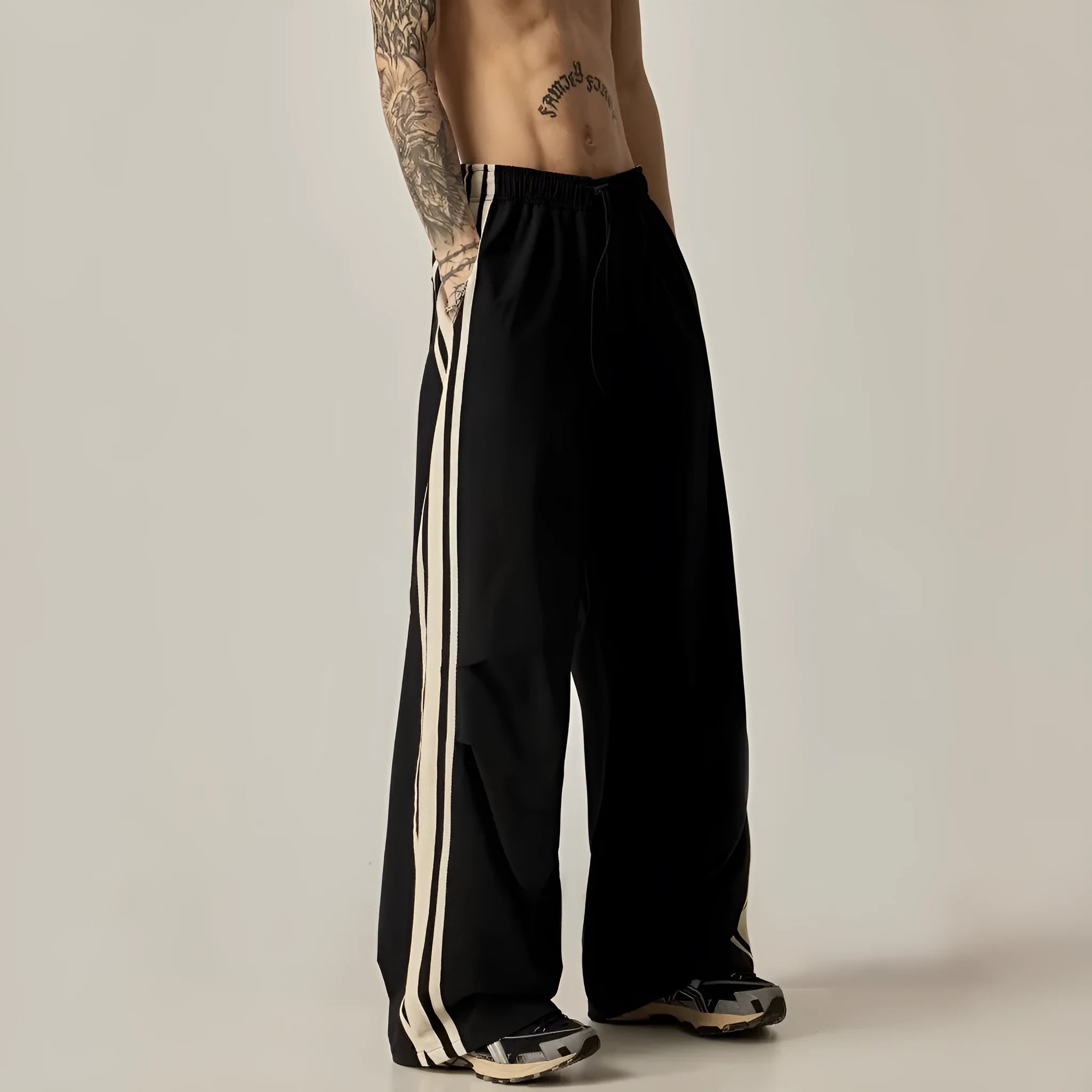 Men's black climbing trousers with high waist and straight wide-leg cut for summer wear