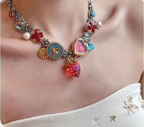 Red strawberry clock butterfly titanium steel necklace with pendant motifs on a single chain