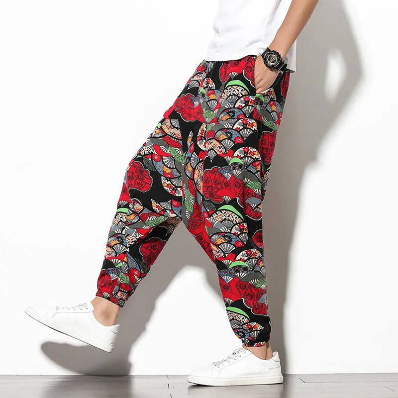 Cotton wide-leg beach trousers with elephant flower print in blue fan colour, nine-point length, mid-waist