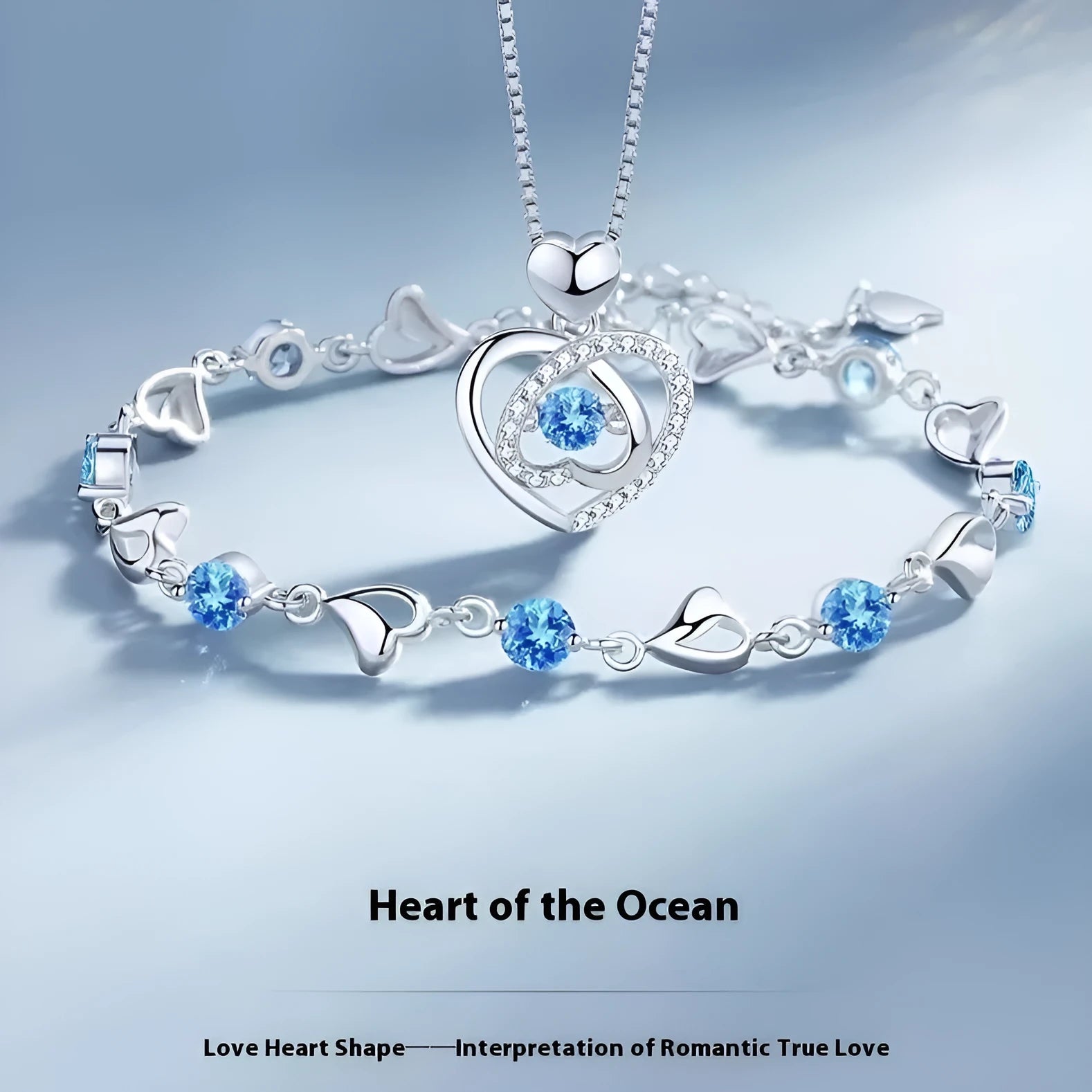 Blue electroplated geometric heart pendant necklace with matching bracelet jewellery set on copper chain