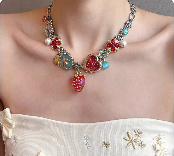 Red strawberry clock butterfly titanium steel necklace with pendant motifs on a single chain
