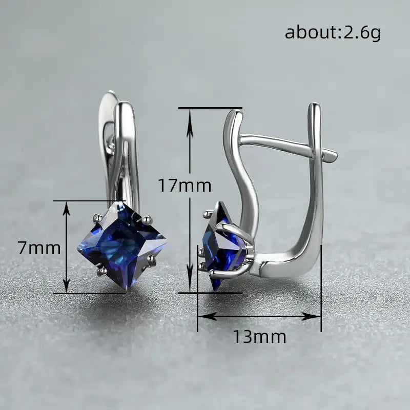 Copper diamond design earrings with inlaid zircon stones in blue, green, and colour options.