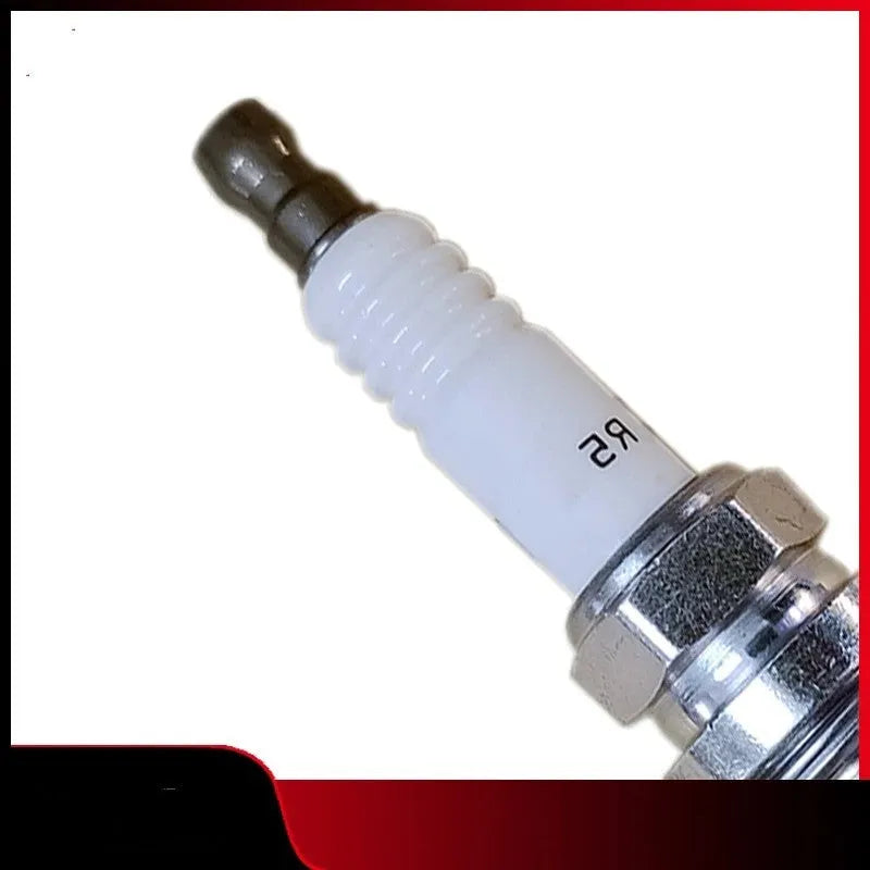 Silver automotive spark plug with 3 kiloohm resistance for BMW, Mini, and Rolls Royce automatic transmission vehicles
