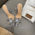 Transparent women's high heels with crystal flower decoration on heel