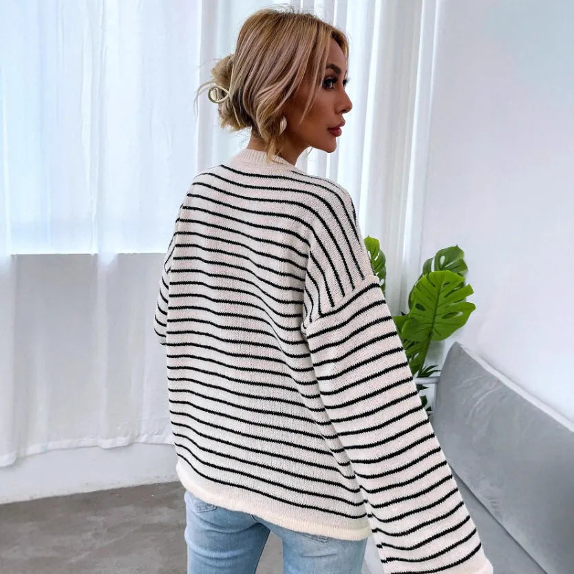 Black striped women's drop-shoulder long sleeve top with button detail