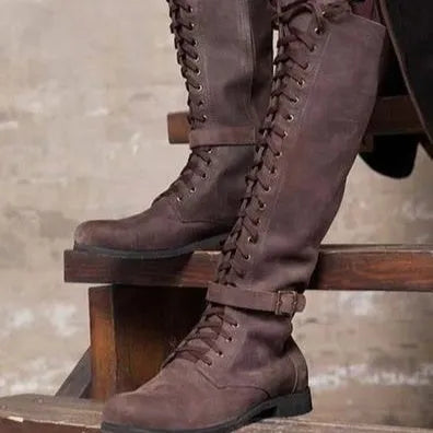 Women's long boots with lace-up front, low heel, artificial PU upper, rubber sole, in black colour