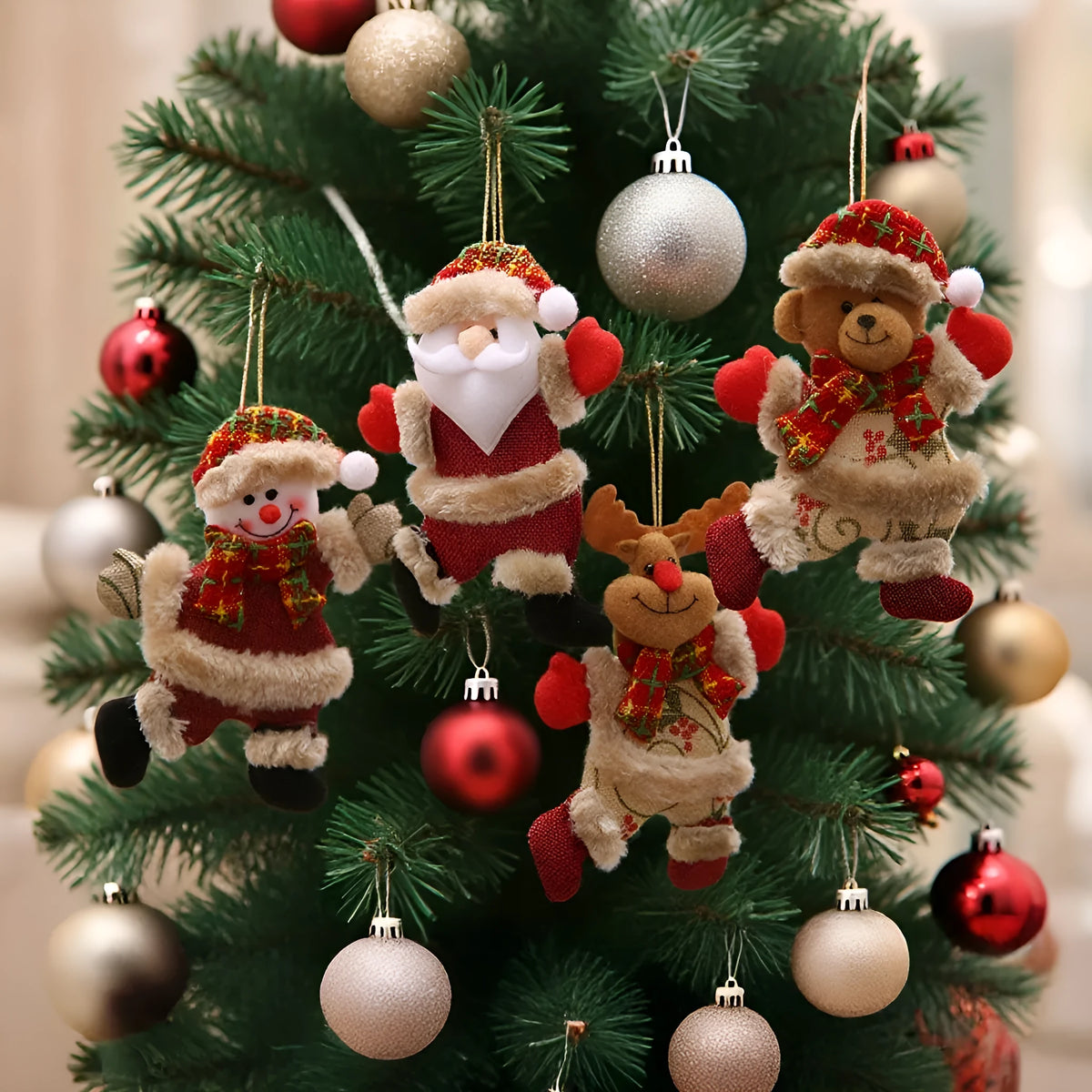 Christmas tree ornaments set with Santa, snowman, reindeer and bear figures in red and white scarves, golden balls and red bows.