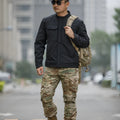 Bone Frog Peak Breaker soft shell tactical jacket in black camouflage colour for mountaineering.