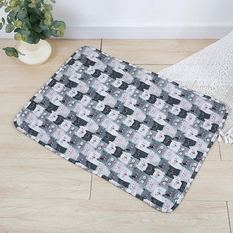 Reusable washable waterproof pet urine pad with non-slip backing in animal print design