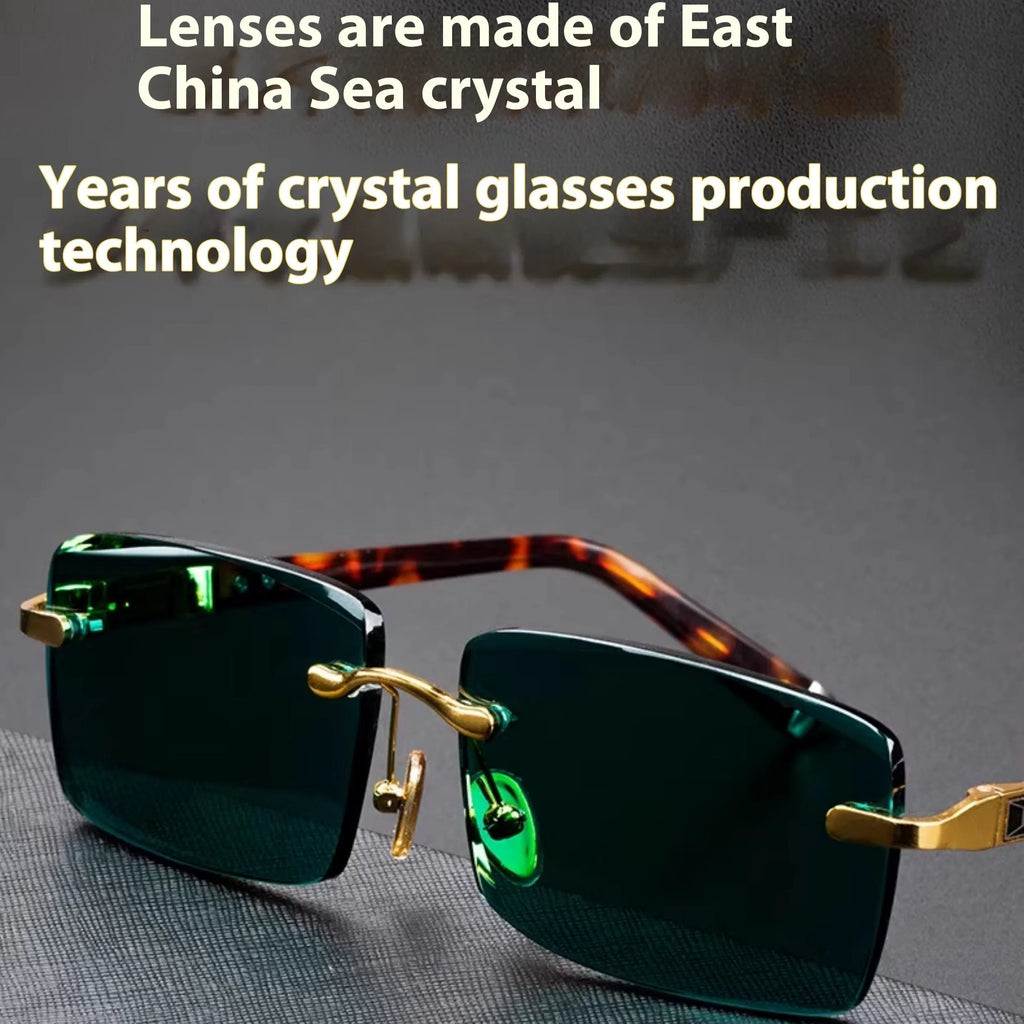 Green frameless reading glasses with dark tinted lenses on protective case