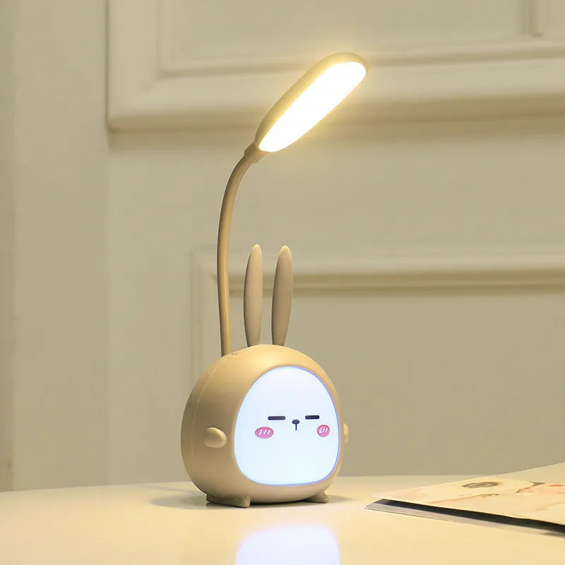 Cartoon deer USB charging folding LED reading lamp with plastic shade on desk
