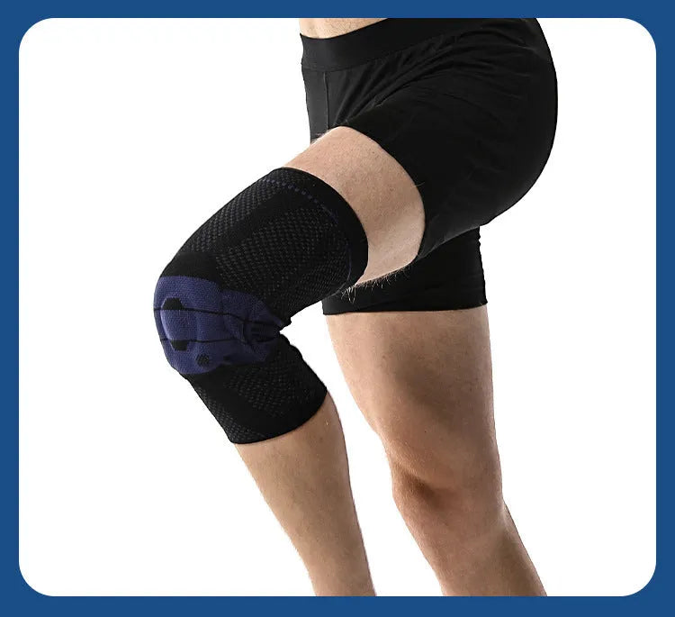 Adult black and blue sports knee pad made of nylon and spandex, shown on a knee.