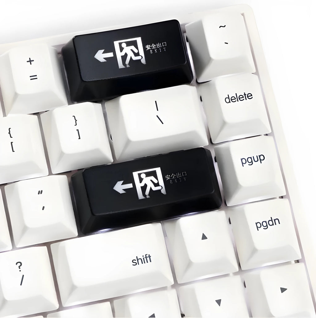 Transparent mechanical keyboard keycap with raised safety evacuation exit symbol for backspace replacement