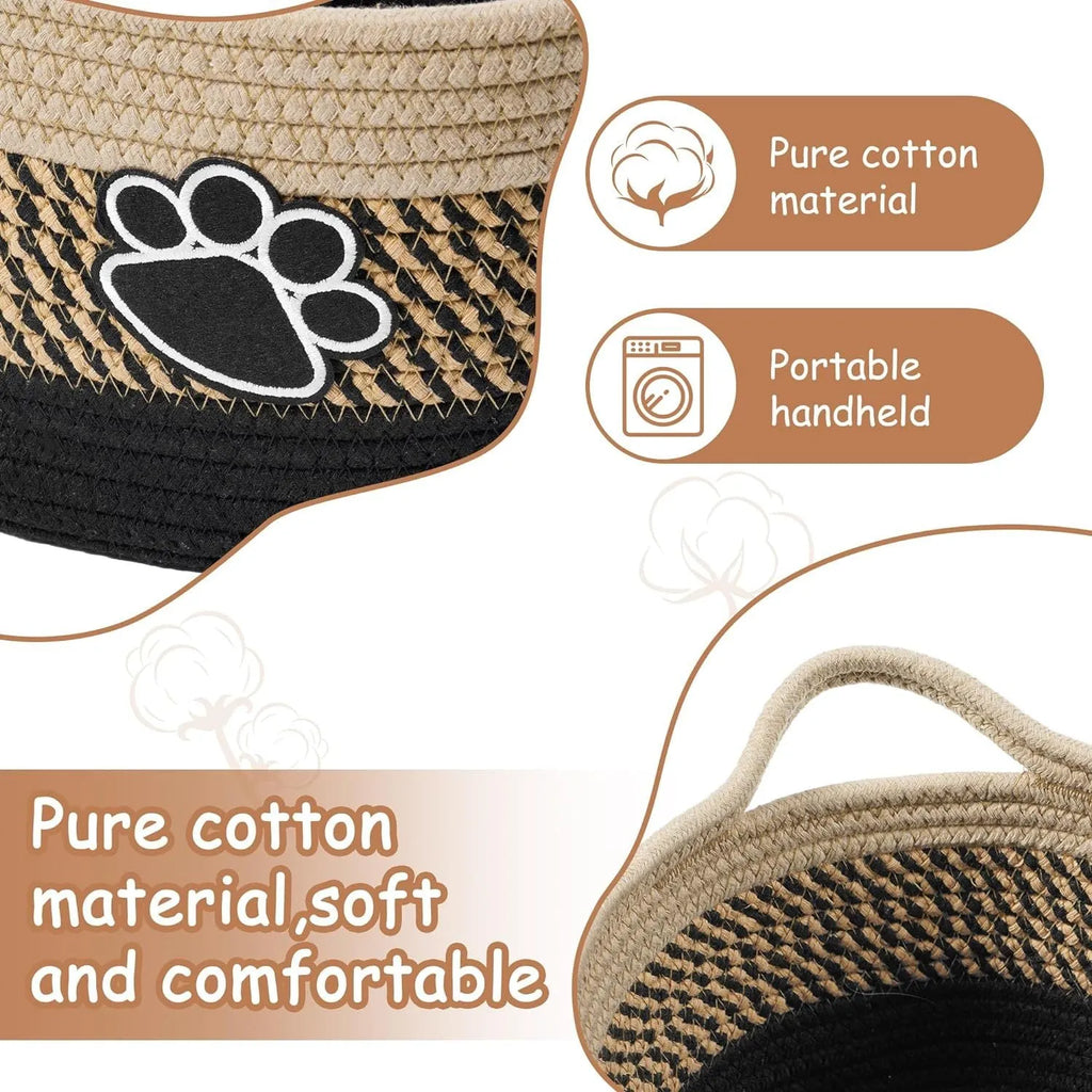 Handmade light beige woven cotton rope storage basket with a wooden handle.