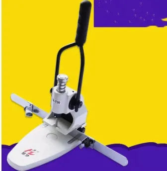 T30 single hole punching machine on desk with paper stack and adjustable pitch guide