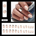 Black and white frosted false nails with Mandarin duck colour pattern and double-piece construction