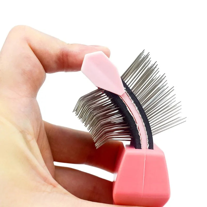 Double-sided pet grooming brush with stainless steel pins and flexible rubber backing in blue colour