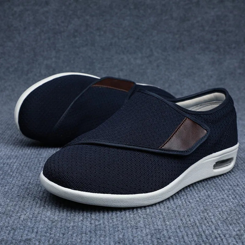 Casual beige leisure shoes with a velcro strap and round toe on a foam rubber sole.