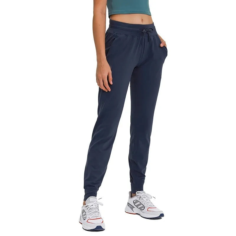 Women's high waist yoga pants with drawstring waistband in cotton blend fabric