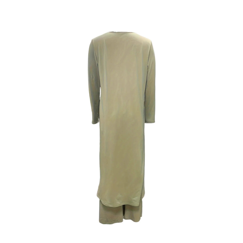 A loose-fitting black two-piece lounge set consisting of a long-sleeve round-neck top and matching trousers.