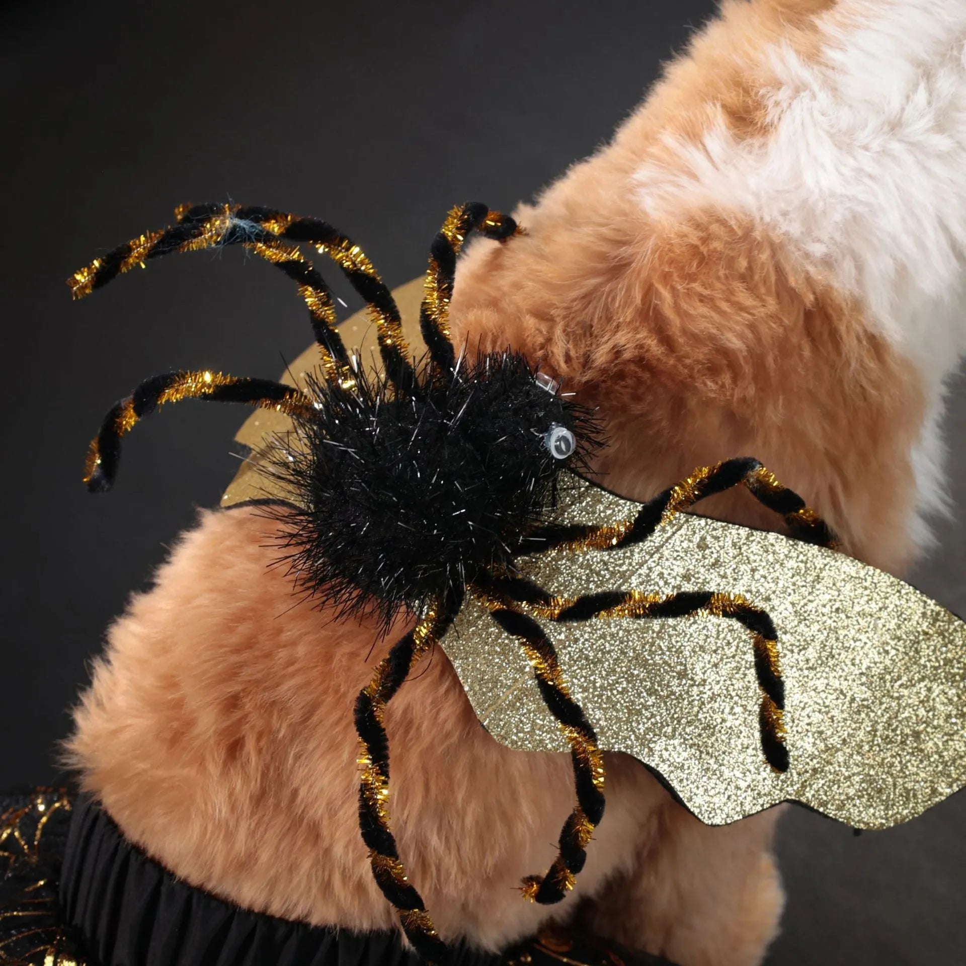 A dog wearing a Halloween costume suit in sizes from small to extra large.