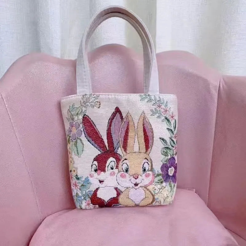 Double-sided gold wire embroidered medium canvas handbag with inner compartment