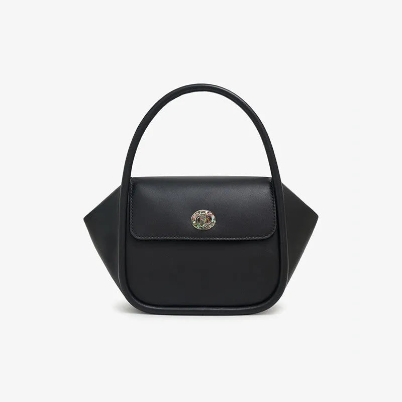 Genuine cow leather women's cross-body wing tote bag with latch closure and adjustable shoulder strap