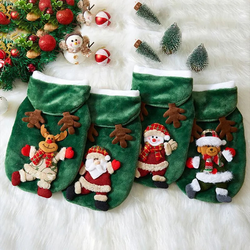 Small dog wearing a Christmas flannel hoodie in Red Santa Claus pattern standing on grass