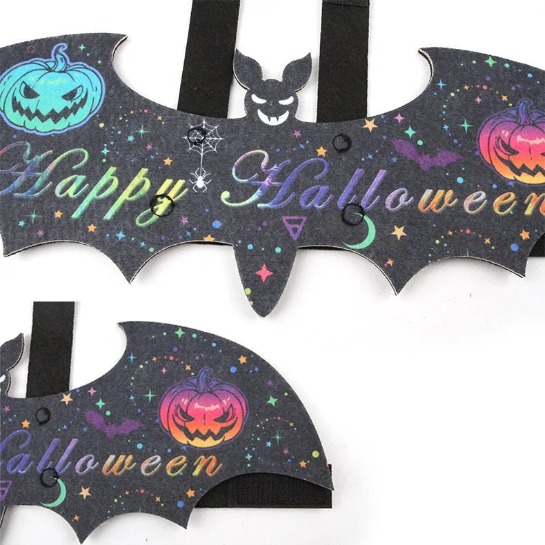 Halloween cat costume with black bat wings in pumpkin, red ghost, or white ghost colour variants with optional bell accessory