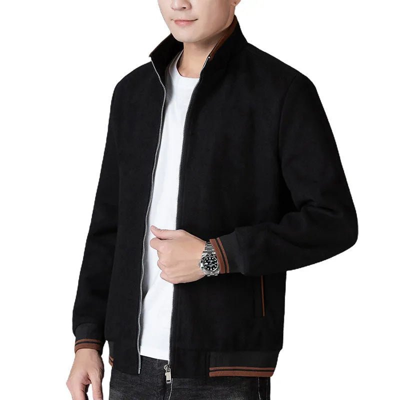 Men's grey polyester fleece jacket with long sleeves and side pockets shown in sports style