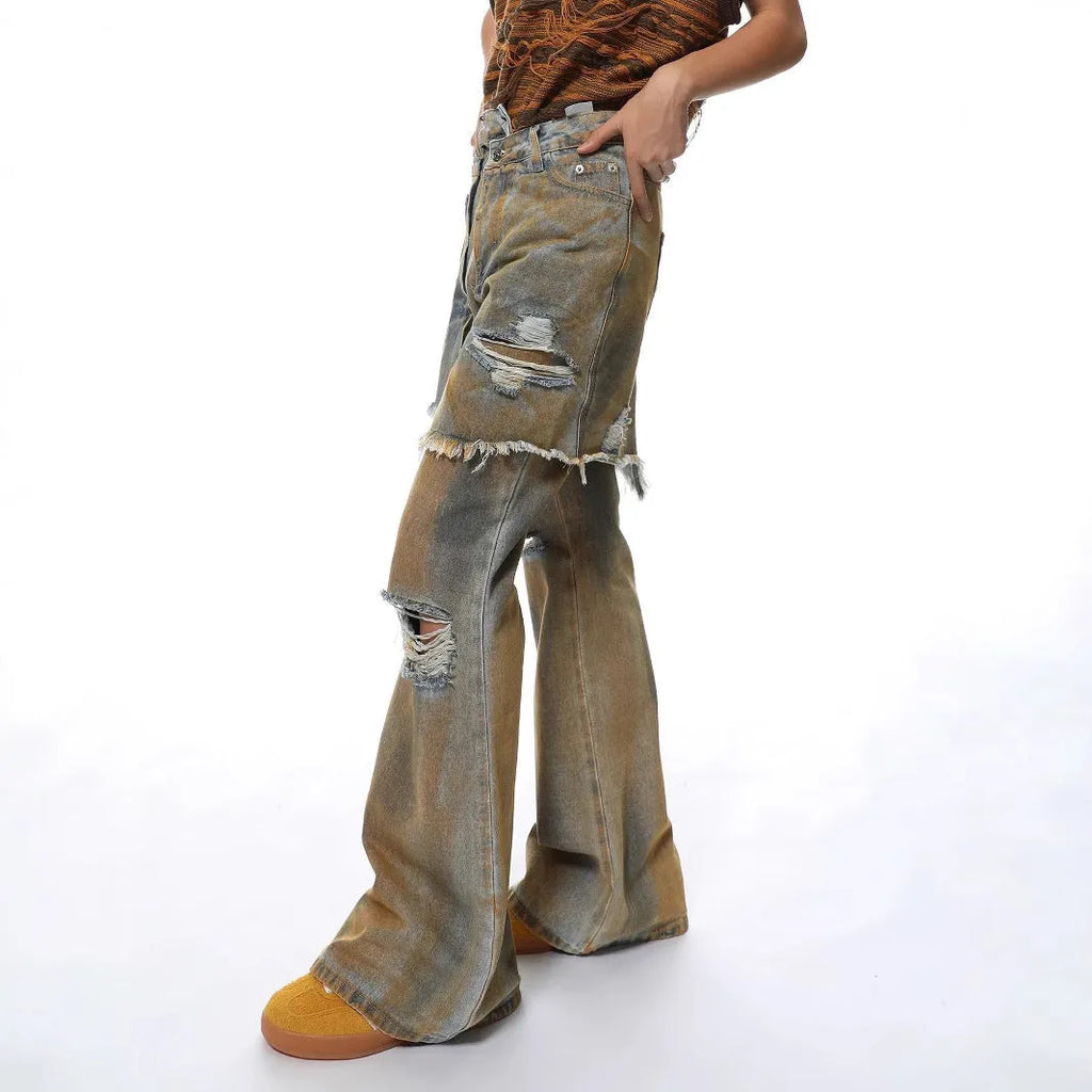 Women's loose-fit light blue bootcut denim jeans with a high waist and button fly.