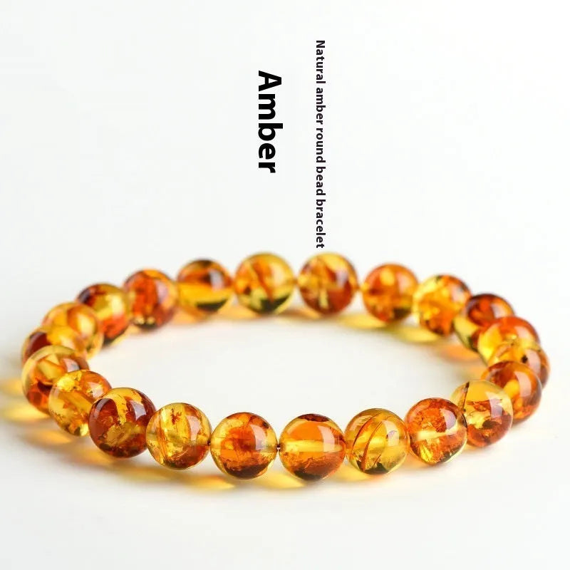 Natural yellow piebald amber bracelet with flower spot patterns and polished geometry beads