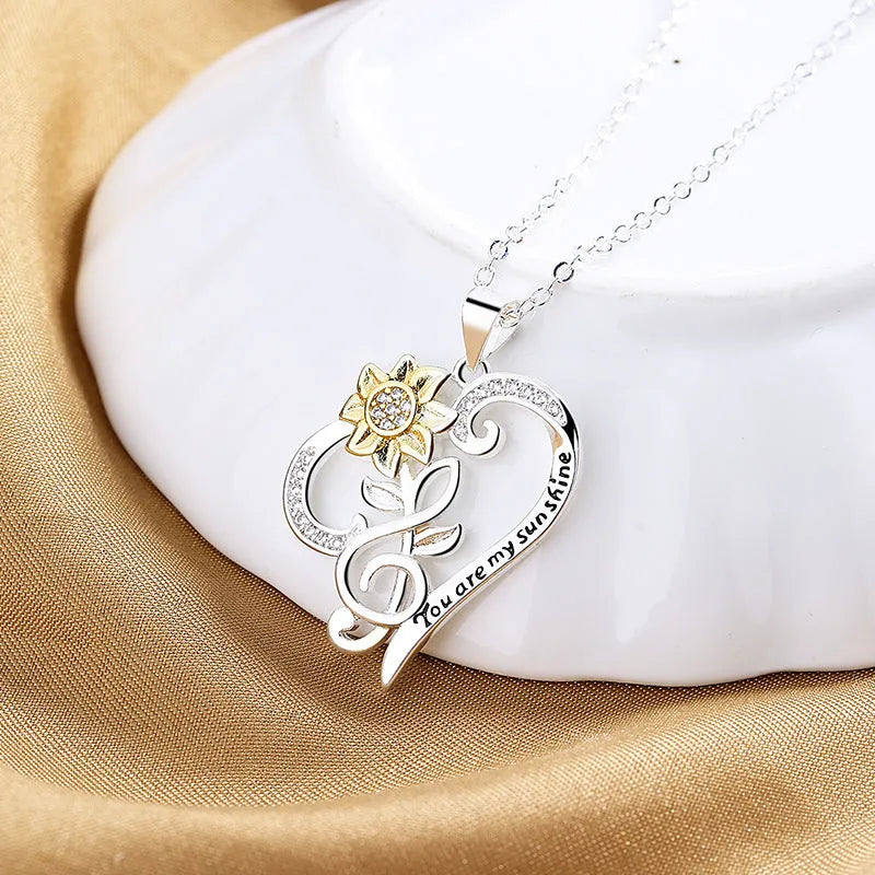 Two-colour copper sunflower pendant on heart-shaped clavicle chain, pastoral style, flower shape