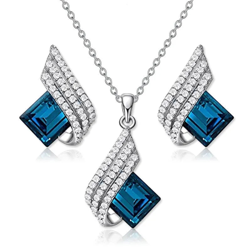Glass pendant on alloy cross chain necklace with matching electroplated earring studs set