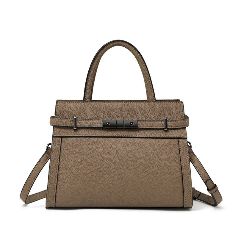 Genuine leather clamshell crossbody handbag for women with multiple internal compartments in five colour options.
