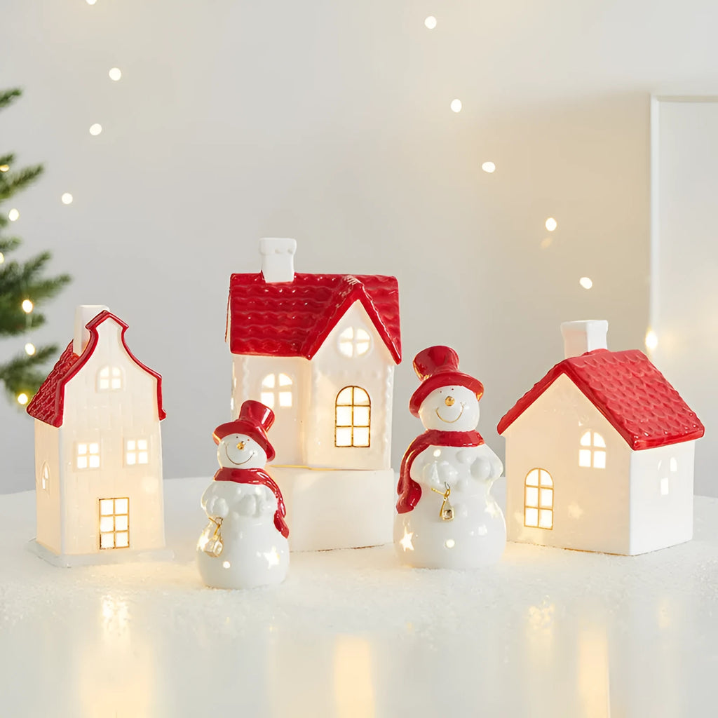 Ceramic Christmas snowman decoration with luminous glow on desktop