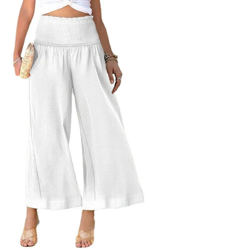 Women's high waist pleated cropped trousers in a cotton linen blend, shown in a straight-leg cut.
