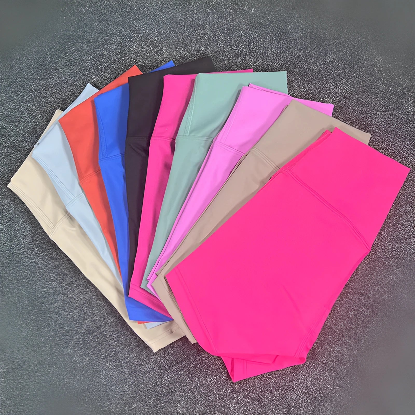 Women's high-waist nylon yoga shorts in various colours for moisture-wicking during exercise