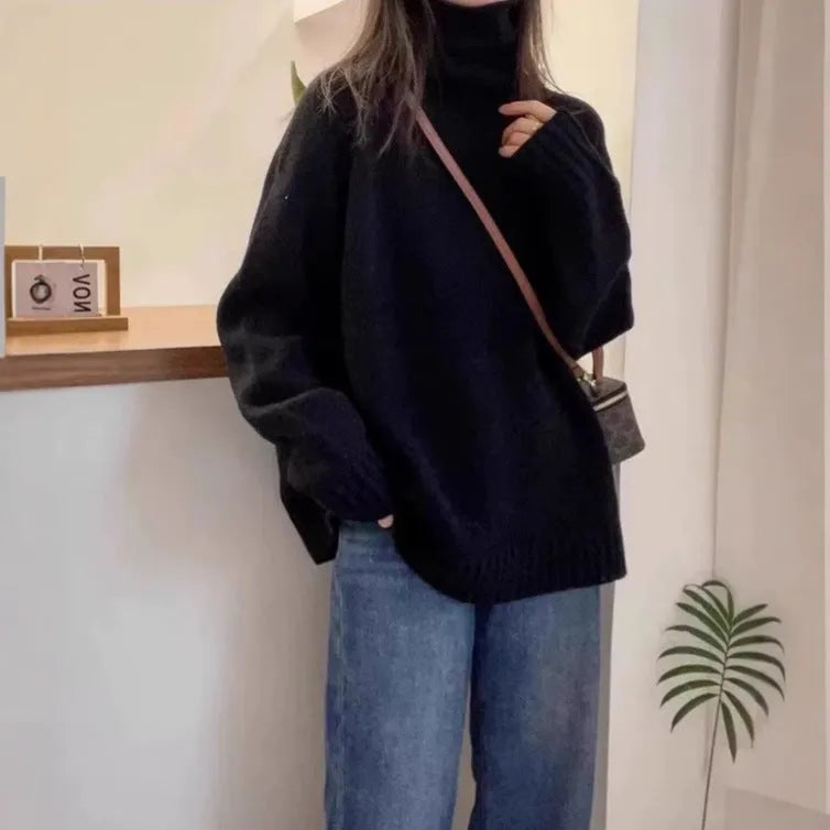 Women's loose fit turtleneck sweater with thick curling pile collar in camel colour