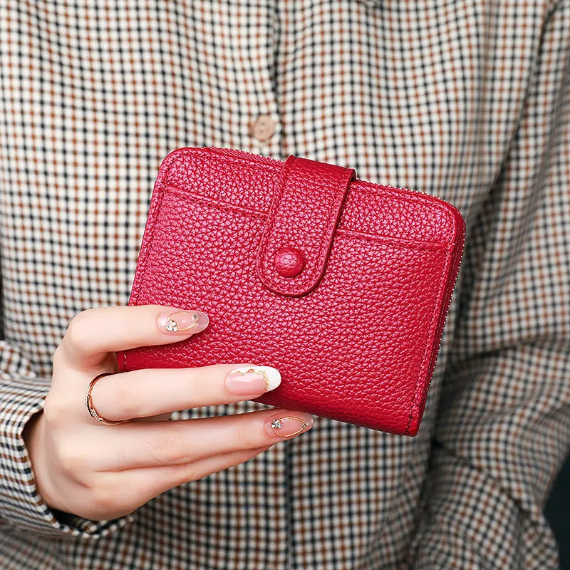 Women's lychee pattern organ short wallet in pu material with breathable antibacterial properties